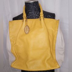 Elie Tahari Women's Leather Handbag. Yellow And Cream Color, 100% Leather, Braided Handles, And A Few Small Interior Pockets. Like New Dustbag Included. Designer Yellow Satchel With Removable Pouch, Designer Yellow Satchel With Handles, Luxury Yellow Shopping Bag, Designer Yellow Satchel With Double Handle, Designer Yellow Satchel With Detachable Strap, Luxury Yellow Shoulder Bag For Shopping, Luxury Yellow Satchel Shoulder Bag, Designer Yellow Pouch Bag, Luxury Yellow Tote Bag