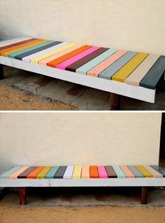 a bench made out of strips of colored wood