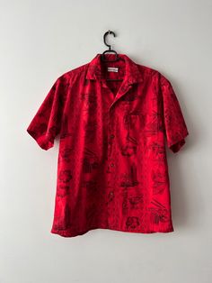 "Vintage Mens Short Sleeve Beach Shirt Hawaiian Shirt Bohemian Summer Singlet Button Up Shirt Size Medium Red Patterned Shirt  N.B. Real color might slightly differ from picture. Estimated  size: M Measurements: (lying flat) Length - 28\"/ 71 cm Shoulders: 19\"/ 48,3 cm Pit to pit: 22.5\"/ 57 cm Sleeve: 10\"/ 25.3 cm Please check measurements to insure a proper fit. Remember to allow yourself some extra room for movement. You can compare these with something from your closet that fits you well. Red Hawaiian Button-up Shirt For Vacation, Red Collared Hawaiian Shirt For Beach, Vintage Red Camp Shirt With Camp Collar, Red Collared Camp Shirt For Vacation, Retro Red Tops For Beach, Casual Red Collared Hawaiian Shirt, Red Casual Collared Hawaiian Shirt, Red Relaxed Fit Hawaiian Shirt For Vacation, Vintage Red Short Sleeve Camp Shirt