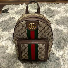 Authentic Gucci Brown Backpack For Daily Use, Gucci Designer Backpack For Everyday Use, Designer Gucci Backpack, Gucci Backpack For Everyday Use, Luxury Gucci Rectangular Backpack, Gucci Rectangular Travel Backpack, Gucci Travel Backpack, Rectangular, Gucci Backpack Bag, Gucci Brown Travel Backpack