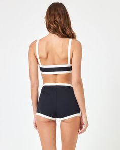 Sail away to somewhere special in the Sailor Shorts. These swim-ready ribbed shorts allow you to get sporty in the water while still showing off thanks to the cheeky style fit and v-front. Wear them with the Taylor or Selena top depending on your desired style. Mid To High Rise Cheeky Boyshort V Front Colorblock Seaming Ribbed Size XS-XL 92% Nylon/8% Spandex Like all delicates, shape, color and fit are best preserved if hand washed in cold water. Lay flat to dry. Style # RHSAF24 Coverage: Bitsy Indah Clothing, Sailor Shorts, Fawn Design, Sparkle Shoes, Ribbed Shorts, Jumpsuit Jacket, The Sailor, Fragrance Collection, Swimwear Sale