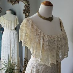 Handmade, I Believe 1970's, Lace Dress In An Ecru Color. Zips Up Back And Has A Long Tie To Wrap Around The Waist A Few Times. Can Be Worn Off The Shoulder. Its An Great Vintage Condition. I've Had This In My Closet A Long Time And Its Time To Find A Loving New Home For Her! Waist: 27" Vintage White Ruffled Dress, Vintage White Maxi Dress With Short Sleeves, Vintage White Dress With Ruffles, White Vintage Maxi Dress With Short Sleeves, Vintage Lace Dresses With Short Sleeves, Cream Lace Vintage Dress For Summer, Bohemian Summer Dresses For Vintage Events, Fitted Vintage Off-white Dress, Beige Vintage Summer Dress