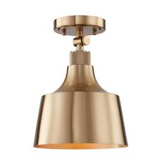 an antique brass finish light fixture with a metal cone shade on the top and bottom