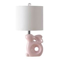 a pink bear lamp with a white shade on it's head and bottom part