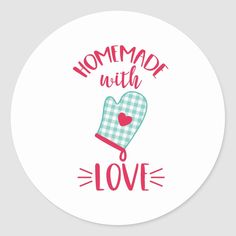 a round sticker with the words homemade with love in pink and green checkered mitts