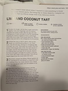 an open book with instructions on how to cook and eat coconuts in it, sitting on a table