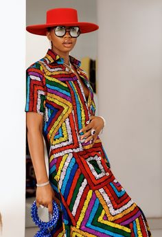 PRODUCT DETAILS: Designed in the U.S., hand-crafted in Africa Delivery within 2 weeks Multiple prints available This sophisticated unlined kaftan dress is designed with traditional African Ankara fabric shown in multi-colors. The buttoned front style is perfect for making a grand impression! Can be worn as evening wear to various events such as weddings, dinner parties and other formal occasions. Model is 5'9 CUSTOM: You pick your fabric and style @ Custom Clothes. FABRIC CARE: Dry Clean. Hand W Multicolor Printed Shirt Dress For Beach, Beach Multicolor Printed Shirt Dress, Multicolor Printed Shirt Dress For Vacation, Traditional Multicolor Tunic Dress, Colorful Printed Vibrant Dresses, Multicolor Shirt Dress For Vacation, Multicolor Short Sleeve Mini Dress With Vibrant Print, Vibrant Multicolor Abstract Print Dress, Multicolor Abstract Print Dress For Parties