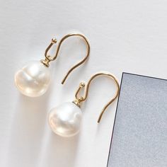 14KT Yellow Gold Paspaley Pearl Bishop Hook Earrings #2/ 12mm, 14KT Yellow Gold Paspaley Pearl Bishop Hook Earrings #2/ 12mm - Legacy Saint Jewelry Classic Hypoallergenic Yellow Gold Pearl Earrings, Classic Pearl Earrings With French Hook, Classic Pearl Earrings With French Hook As Gift, Classic Pearl White Pear-shaped Earrings, Formal Pear-shaped Pearl Earrings With Ear Wire, Classic Round Pearl Earrings With French Hook, Classic Hypoallergenic Pear-shaped Pearl Earrings, Classic White Pearl Earrings For Everyday Elegance, Gold Briolette Pearl Earrings For Formal Occasions