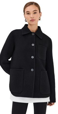 Find JIL SANDER Doubleface Jacket on Editorialist. Fabric: Heavyweight felted wool. Collared neck. Long sleeves with button cuffs. Button placket. Patch breast and hip pockets. Shell: 100% virgin wool. Dry clean. Made in Italy. Measurements: Measurements from size 34 Length: 26.5in / 67.0cm, from shoulder Black Wool Coat With Button Cuffs For Work, Classic Wool Blazer With Buttoned Pockets, Black Pea Coat With Button Cuffs And Lapel Collar, Black Wool Outerwear With Button Closure, Collared Wool Coat With Pockets, Wool Button-up Blazer With Button Cuffs, Wool Button-up Outerwear With Button Cuffs, Wool Blazer With Button Cuffs, Wool Collared Outerwear With Buttoned Pockets