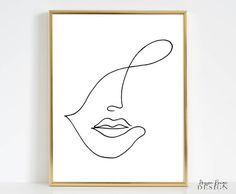 a black and white line drawing of a woman's face on a white wall