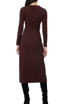 This quintessential wrap sweater-dress knit from luxe wool and cashmere features a sultry dipped neckline and waist-cinching sash. Surplice V-neck Long sleeves 70% wool, 30% cashmere Dry clean Imported Elegant Cashmere Sweater Dress For Winter, Elegant Long Sleeve Cashmere Sweater Dress, Fitted Cashmere Sweater Dress For Fall, Elegant Cashmere Sweater Dress For Work, Elegant Winter Cashmere Dress, Fitted Cashmere Dresses For Fall, Fitted Long Sleeve Cashmere Dress, Elegant Brown Long Sleeve Sweater Dress, Elegant Long Sleeve Brown Sweater Dress