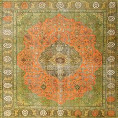 an orange and green rug with medallions on the center, surrounded by ornate designs