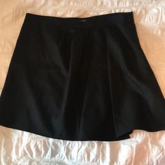 Never Worn Pleated Skirt With Side Zipper Black Mini Skirt With Short Inseam And Lined, Black Pleated Skirt For Spring With Short Inseam, Formal Lined Skort, Black Lined Skort With Short Inseam, Black Short-inseam Skort With Lined Skirt, Black Pleated Skort For Work, Workwear Lined Skort, Pleated Full Skirt Skort For Workwear, Black Formal Skirted Skort