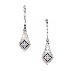 Vintage turn of the century diamond and sapphire dangle drop earrings. These vintage antique earrings were created in the late 1890s early 1900's. Handmade with a cluster of old European, rose cut diamonds and baguette sapphires. The incredible detail and craftsmanship of these earrings is not easily found in todays creations. The surface of these earrings are platinum while the backs are 18k yellow gold. The 14k yellow gold La Pousette style safety friction backs are a later time period. 4 old Cabin Door, Antique Wedding Bands, Diamond Sapphire Engagement Ring, Antique Engagement Rings Vintage, Antique Bracelets, Vintage Sapphire, Diamond Engagement Rings Vintage, Vintage Wedding Band, Turn Of The Century