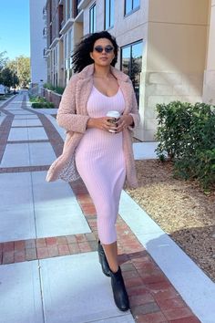 A solid hued fitted maxi dress featuring long sleeves and a v-neckline. Stretch V-neck Midi Dress For Winter, Winter Stretch V-neck Midi Dress, Winter V-neck Stretch Midi Dress, V-neck Bodycon Dress For Winter, Pink V-neck Maxi Dress For Fall, Winter Pink V-neck Midi Dress, Solid V-neck Bodycon Dress For Winter, Pink Long Sleeve Maxi Dress For Winter, Trendy V-neck Bodycon Midi Dress