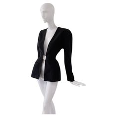 Stunning extraordinairy MUGLER blazer. This is giving strong femme fatale & Helmut Newton photography vibes. Very rare Mugler ceration with silver metal padlock closure. Black wool jacket with deep V-neck and FABULOUS unique closure. Typical Mugler-esque dramatic and super feminine shape with fitted waist. length mid shoulder to hem ca.69cm waist lying flat ca.35cm lying flat Helmut Newton, Wool Jacket, Black Wool, Black Silver, Blazer Jacket, Metallic Silver, Metallica, V Neck, Blazer