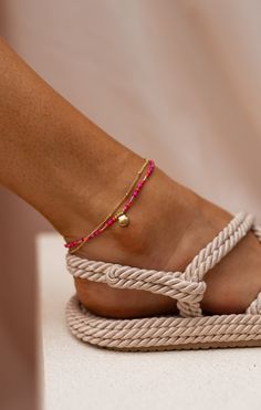 Perfect anklet that features delicate pink pearls that add a touch of femininity and charm. The centerpiece of the anklet is a beautiful shell pendant, creating a beach-inspired look that is perfect for adding a hint of coastal elegance to any outfit! Colors: pink - multicolor Pink Tiny Beads Anklets For Summer, Pink Anklets With Tiny Beads For Summer, Pink Beaded Anklets For Summer, Pink Beaded Summer Anklets, Coral Jewelry For Summer Beach Occasions, Summer Beach Coral Jewelry, Adjustable Pearl Charm Anklets For Summer, Beaded Anklets For The Beach, Dainty Pink Jewelry For Beach