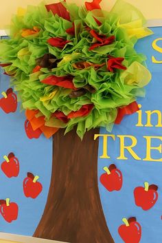 an apple tree made out of tissue paper