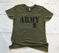 Army T-shirt. Simply stated. Thank you for your service! **LADIES CUTS RUN SMALLER, PLEASE order accordingly. Please look closely at size chart before ordering. **Some variation in color occurs in the ladies to mens cuts (They are not the same brand). The fonts may be adjusted slightly as well.**You can request different color T-shirts as well Pretty simply stated for our support of our military troops! These are all soft cotton, OD Green t-shirts in ladies cut OR Unisex Cut T-shirts! I do not u Construction Outfit, Army Family, Mens Cuts, Green Tshirt, Cut Tshirt, Workout Wear, Tshirt Colors, Size Chart, Long Sleeve Tshirt Men