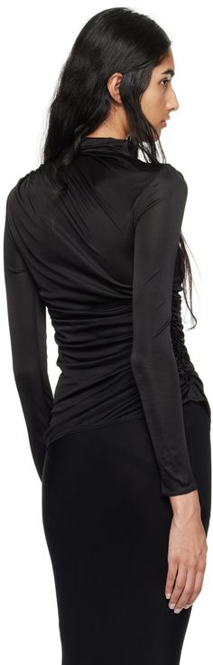 Semi-sheer stretch nylon jersey turtleneck. Ruching throughout. · Draped construction · Turtleneck Supplier color: Black Black Second-skin Top For Party, Elegant Second-skin Tops For Night Out, Elegant Ruched Tops For Layering, Fitted Evening Top With Ruched Sides, Black Ruched Evening Blouse, Fitted Tops With Ruched Sides For Evening, Black Stretch Ruched Blouse, Elegant Tops With Ruched Sides For Evening, Elegant Evening Tops With Ruched Sides