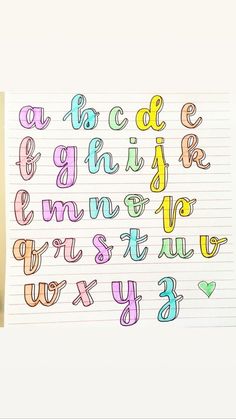 the letters are drawn on lined paper with marker pens and pencils next to each other