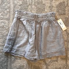 Super Cute Linen High Waisted Shorts - They Are Grey With Blue/Lilac Undertones - Women’s Small But Can Fits A Medium Gray Beach Shorts For Spring, Gray Summer Shorts For Vacation, Gray Summer Vacation Shorts, Gray Beach Shorts, Gray Cotton Beach Shorts, Gray Bottoms For Spring Vacation, Gray Summer Shorts With Elastic Waistband, Gray Shorts With Short Inseam For Summer, Gray Short Length Beach Bottoms