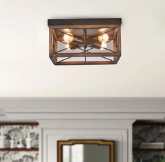 a light fixture hanging from the ceiling in a room