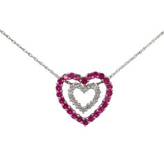 Vintage 14k White Gold Pink Topaz & Round Diamond Dual Heart Charm Necklace This necklace features 2 heart charms that can be worn together or individually. Topaz Heart 18x18mm 24 round pink topaz - 0.04ct each Diamond Heart 10x10mm 20 round diamonds - 0.0067ct each 18" baby rope chain spring ring closure Gem weight 0.96ctw topaz 0.07ct diamond 1.03ctw combined For more of our jewelry products, please visit our shop 777jewelryLAFree shipping on all orders within USA.International shipping availa Pink Diamond Heart Cut Necklace, Diamond White Heart-cut Diamond Necklace, Pink Heart Cut Gemstone Necklace, Pink Heart-shaped Diamond Necklace, White Diamond-cut Heart Pendant Necklace, Phone Items, Topaz Necklace, Pink Topaz, Diamond Charm