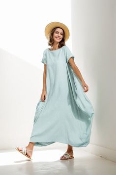 This long cutton dress is loose and casula style, this summer dress is popular with womens.it has a assymertial hem, and with two side pockets. the green dress is soft and comfortable. Light weight and easy to wear, this casual mint green  linen in a flattering loose-fitting style. The designer dress is the epitome of feminine chic and is sure to turn heads. it is made of print linen fabric it has no ining it has two side pockets  Happy customers said this:  I received my 2 dresses today,and they are beautiful I had a white dress made a couple of months ago and I loved it so much that I ordered a second dress in red and a third dress in blackI will be ordering more of the linen dresses that I love from my favorite shop. Sincerely, Mandy. U.S.A.  Wonderful dress. Made to order just to my si Casual Plain Linen Summer Dress, Casual Maxi Dress With Pockets For Vacation, Casual Solid Maxi Dress With Asymmetrical Hem, Casual Solid Midi Dress With Asymmetrical Hem, Summer Solid Color Shift Maxi Dress, Flowy Short Sleeve Solid Color Maxi Dress, Summer Shift Maxi Dress In Solid Color, Flowy Short Sleeve Maxi Dress In Solid Color, Flowy Summer Maxi Dress With Pockets