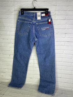 Up for grabs is a brand new VTG Tommy Hilfiger Denim Jeans Blue Classic Fit Straight Leg 90s Y2K Women's Juniors Size 5/28. Never worn or used. Measurements Laying flat are included in photos, PLEASE compare them to your own for proper fit! Please refer to all photos. Ask any questions prior to purchasing. Thanks! Browse my store for other great listings!!! NEW listings added daily!!! PLEASE VIEW PHOTOS VERY CAREFULLY BECAUSE THEY ARE APART OF THE DESCRIPTION AND SHOWS IN GREAT DEPTH THE CORRECT 90s Style Mid-rise Blue Jeans, 90s Style Blue Mid-rise Jeans, Casual Mid-rise Bottoms By Tommy Hilfiger, 90s Blue Jeans With Five Pockets, Tommy Hilfiger Blue Straight Leg Bottoms, Tommy Hilfiger Blue Denim Bottoms, Tommy Hilfiger Casual Jeans For Spring, 90s Denim Blue Jeans With Five Pockets, Fit Y2k