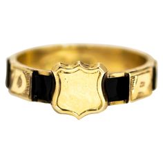 This superb antique Victorian ring is embossed with a fine shield motif at its front, and around the band hand-chased gold letters spell "REGARD" between immaculate sections of black enamel. Modelled in 10 karat yellow hold. These rings were traditionally given as romantic gestures. Ring Size: UK O, US 7 Band Width: 4.64 mm Regard Ring, Antique Rings Victorian, Victorian Ring, Victorian Rings, Gold Letters, Jewelry Lover, Antique Victorian, Black Enamel, 10k Gold