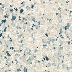 an abstract background with small pieces of glass on the floor and in the middle, light blue speckles