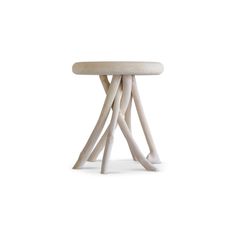 a white table with wooden legs on it