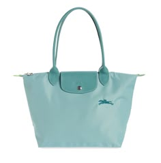 NWT Longchamp Le Pliage Green Medium/Small Shoulder Tote with Long Handles - 100% AUTHENTIC Guaranteed! From a reliable and experienced Top Rated Plus US Seller, 15 years on eBay!     Color: Lagoon (also available in our eBay store many other colors)     Style #: L2605919P65     Brand new in original packaging, MINT condition, never been used!     100% authentic guaranteed! Receipt copy for tote available upon request (after purchase)!     Excellent gift idea! Not too big, not too small, Longcha Longchamp Colors, Long Champ Bag, Longchamp Le Pliage Green, Le Pliage Medium, Longchamp Le Pliage Medium, Long Champ, Longchamp Bag, Parisian Vibes, Longchamp Bags