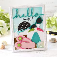 a hello beautiful card with an umbrella and flip flops