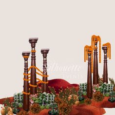 an artistic rendering of candles and flowers in the middle of a desert area with rocks