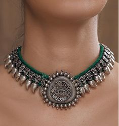 Description: Dazzling choker adorned with exquisite embellishments. This captivating piece is designed to beautifully accentuate your neckline, adding a burst of festive energy to your traditional attire. The intricate detailing and vibrant decorations capture the essence of the celebrations, making it the perfect accessory for Garba and other festive occasions. Let this stunning collar necklace reflect your lively spirit and radiant beauty as you dance through the nights of joy and celebration. Cheap Party Jewelry For Navratri, Luxury Necklaces For Navratri Rituals, Temple Jewelry Choker For Festivals, Heavy Necklaces For Navratri Party, Tilla Necklace For Navratri Party, Heavy Necklace For Navratri Party, Heavy Navratri Party Necklaces, Navratri Party Necklace With Tilla Details, Navratri Party Necklace With Tilla