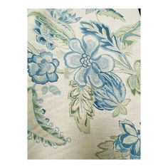 a blue and green floral print fabric