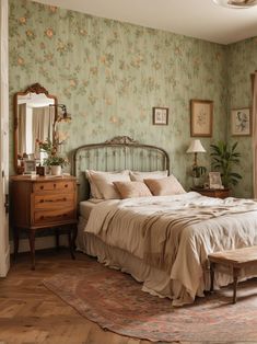 a bed sitting in a bedroom next to a dresser and mirror on top of a wooden floor