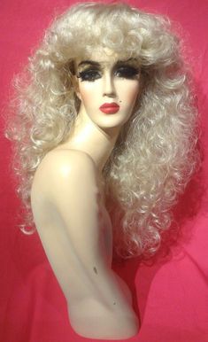 Lace front wigs and wigs with bangs, ideal for drag queens, cosplay characters, party celebrations, theatre, and wigs for women. SHIPPING UPGRADES AVAILABLE EXPRESS HANDLING (1-2 DAYS, $100) EXPEDITED HANDLING (3-5 DAY, $75) STANDARD (APPROX. 2 WEEKS, FREE)  READ BEFORE YOU BUY! ALL SALES ARE FINAL, NO EXCEPTIONS!  If you chose to purchase without reading the following listing information, you will NOT be refunded. By purchasing this item, buyer agrees without exception to all Terms of Service: Ash Blonde Bangs, Feather Bangs, Dolly Parton Wigs, Blonde Pony, Disco Hair, Medium Ash Blonde, Wig Costume, Feathered Bangs, Blonde Bangs