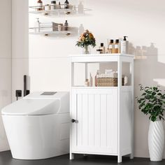 a white toilet sitting next to a wooden shelf filled with bottles and containers on top of it