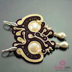 Long statement beige earrings, creamy brown soutache earrings, creamy brown earrings, long earrings with pearls, impress bridal earrings  FAST SHIPPING - order is delivered to you by COURIER SHIPMENT  (phone number required)! Soutache Earring Dewi Air White, created in Soutache embroidery, come from the Mother Goddess collection which refers to a goddess who represents, or is a personification of nature, motherhood, fertility, creation, destruction. The collection attempts to express my fascination with the colours of nature. That is why I have used: browns, gold, yellows, oranges, reds, greens, navy blues, beiges, grays and blacks. ITEM DETAILS: *MATERIALS: seashel pearl, rhinestone tape, Soutache cords, Fire Polish, Toho beads, creamy alcantara *COLORS: creamy, navy, brown (Soutache cord Elegant Beige Earrings For Wedding, Elegant Handmade Cream Earrings, Elegant Cream Earrings For Party, Wire Clasp, Beige Earrings, Earrings With Pearls, Smart Jewelry, Brown Earrings, Toho Beads