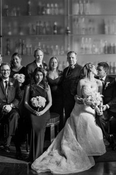 a black and white photo of a wedding party