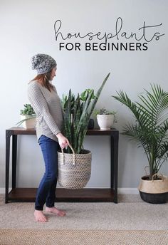 a woman standing in front of a potted plant with the words houseplants for beginners