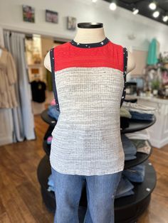 Effortlessly steal the spotlight in our Star Of The Show Tank Top. This two-tone, slub knit tank features stylish color blocking and delicate lace insets for a touch of feminine flair. The star print adds a playful touch to the round neck and sleeveless design. Perfect for any casual occasion. You need this for the upcoming holidays! Ivory/Red/Navy Casual Stretch Tank Top With Contrast Trim, Sleeveless Tops With Contrast Color For Spring, Casual Sleeveless Top With Contrast Color, Spring Sleeveless Top With Contrast Color, Contrast Color Sleeveless Tops For Spring, Cotton Top With Contrast Lace For Summer, Casual Summer Tank Top With Contrast Trim, Casual Crew Neck Pointelle Knit Tank Top, Spring Tops With Contrast Trim For Layering