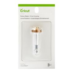 the cricut battery holder is packaged in a white package with gold trimming