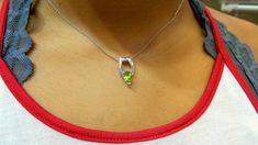 9 mm by 7 mm genuine peridot. pair shaped slide necklace . it is the august birthstone. and it perfect for bridal party gifts it matches with soo many dress colors. and awesome to ware long after . METAL: 925 SILVER STONES: GENUINE PERIDOT STYLE: SLIDE NECKLACE PURITY: 925 STERLING SIZE: 18 MM TOP TO BOTTOM AS IT IS WITH THIS ITEM ALL MY PIECES ARE HAND MADE. AND I STAND BEHIND EVERY PIECE. SATISFACTION GUARANTEED. FIND OUT ABOUT OUR LAYAWAY PAYMENT PLAN AND HASSLE FREE RETURNS IF THERE IS ANY A Fine Jewelry Lime Green Birthstone, White Gold Peridot Jewelry With Birthstone, Formal Lime Green Peridot Jewelry, Fine Jewelry Peridot Necklace For Anniversary, White Gold Peridot Jewelry For May Birthstone, Lime Green Birthstone Jewelry For Anniversary, Anniversary Peridot Birthstone Necklace, Elegant Lime Green Sterling Silver Jewelry, Anniversary Lime Green Birthstone Jewelry