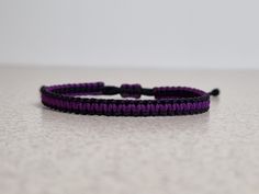 The simple two colors macrame bracelet is handmade with care and attention to details. These bracelets are made with durable yet soft nylon - the high-quality Chinese nylon cord. Each knot is meticulously tied, resulting in a stunning pattern.  The minimalist design 'friendship' bracelet. This design has been combined in two colors - black and purple. The neutral black color perfectly highlights the purple color. That creates a wonderful look. These bracelets are fully adjustable. There are avai Square Knot Friendship Bracelet, Friendship Bracelets Simple, Knot Friendship Bracelet, Diy Friendship Bracelets, Purple Macrame, Macrame Square Knot, Square Knot Bracelets, Bracelets Simple, Bracelets For Boyfriend