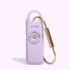 an electronic device with a keychain attached to it's side and the word birdie written on it