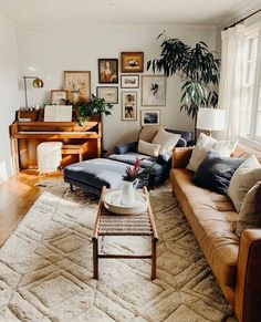 a living room filled with furniture and a piano